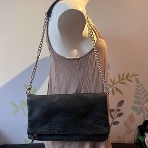 Beautiful pleather and chain purse with magnetic flap.